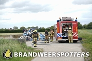 Vrachtwagen in brand Kamersteeg in Hank