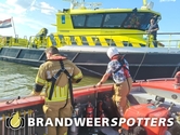 Schip in brand Zuidergat van de Visschen in Lage Zwaluwe
