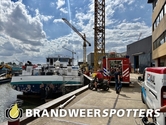 Schip in brand Biesboschhaven Noord in Werkendam