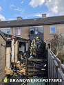 Woningbrand (middel brand) Heren van Brechtlaan in Dussen