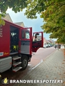 Gebouw in brand Dorpsstraat in ST. WILLEBRORD